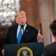 President Donald Trump gets into an exchange with CNN reporter Jim Acosta during a news conference a day after the midterm elections on November 7, 2018 in the East Room of the White House in Washington, DC.